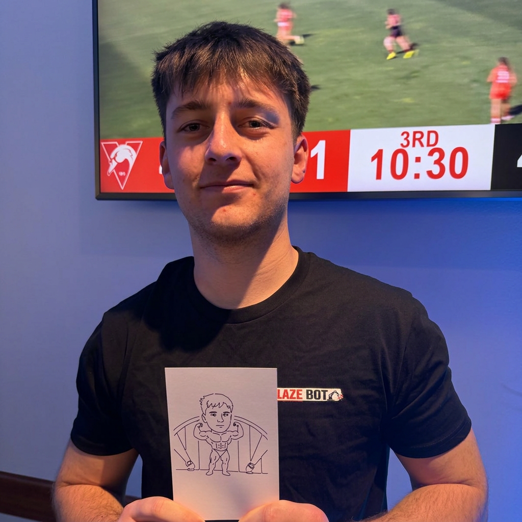 Ryan holding a Blazebot portrait